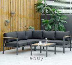 Ensemble de jardin en métal : Grand canapé d'angle avec coussins, table basse de patio et mobilier de salon.