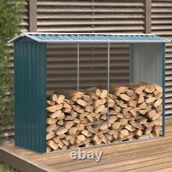 Hangar de stockage métallique extérieur pour outils de jardin, bois de chauffage et empilage de bois de chauffage.